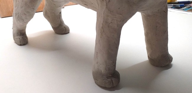 Paper pulp to create paws.